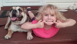 Biscuit and Sky silly face.webp