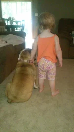 Ryan standing by biscuit.webp